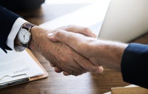 Two people shaking hands